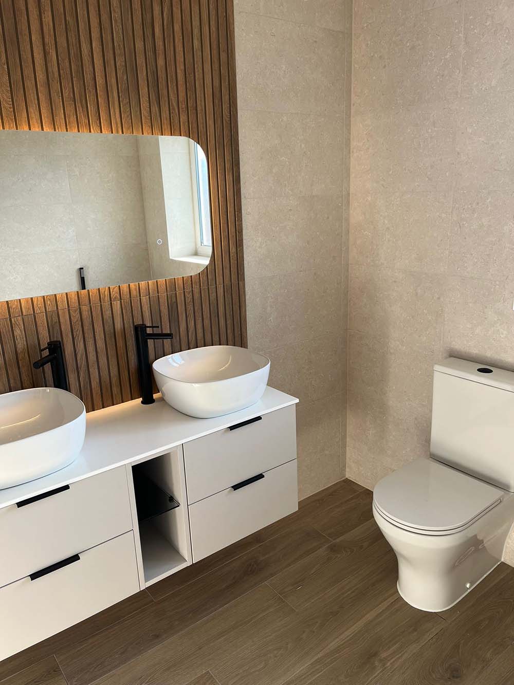 Double sink with mirror, toilet, bathroom installation by Morris-Last plumbing and heating services, Rossendale